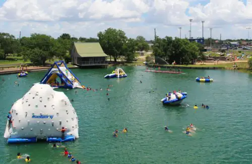 Huge swimming area at Camp West with water toys and bouncers