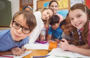 Language Kids World-working together in class; foreign language program