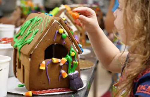 Building gingerbread house at Phoenicia Specialty Foods special event