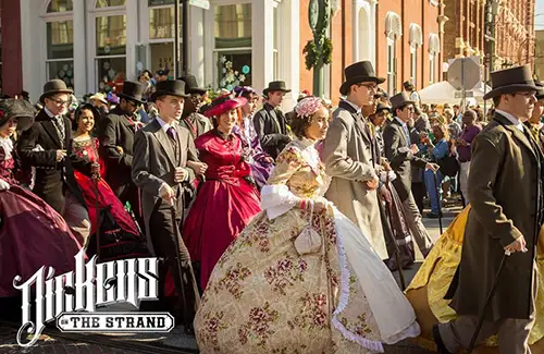 Parade of people at the Dickens on the Strand; holiday gifts and activities