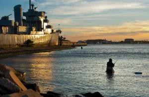 fishing in front of the Galveston Naval Museum at sunset
