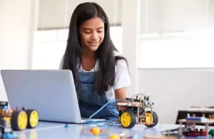 Spark Access STEM camp; kids working together on project during STEM camp; STEM STEAM and coding summer camps