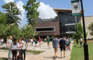 John Cooper campus with students and building in background