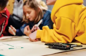 Spark Access STEM camp; kids working together on project during STEM camp