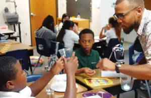 The Varnett Public School students and teacher working in classroom