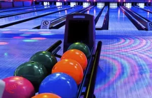 Family fun at Tomball Bowl during Neon Nights.