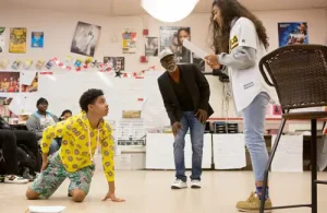 Students acting out a scene in classroom at Children Come Click