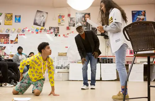 Students acting out a scene in classroom at Children Come Click