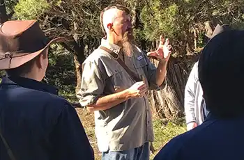 Mark “Merriwether” Vorderbruggen talking to a group about foraging.