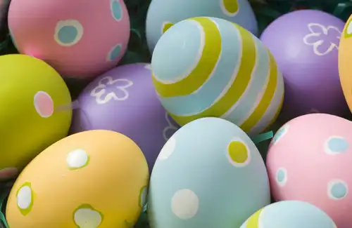 Colorful Easter eggs covering the background.