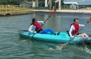 Two girls kayaking together at Sea Center Texas.