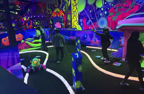 Glow in the dark mini golf at Seismique.