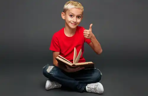 Image for Read-A-Rific showing child sitting on the floor holding a book with his thumb up.