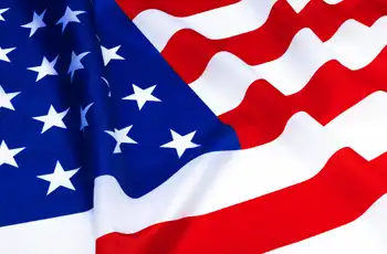 Texas Blue Star Museums 2026 blog article opening image of a large American flag waving in the wind.
